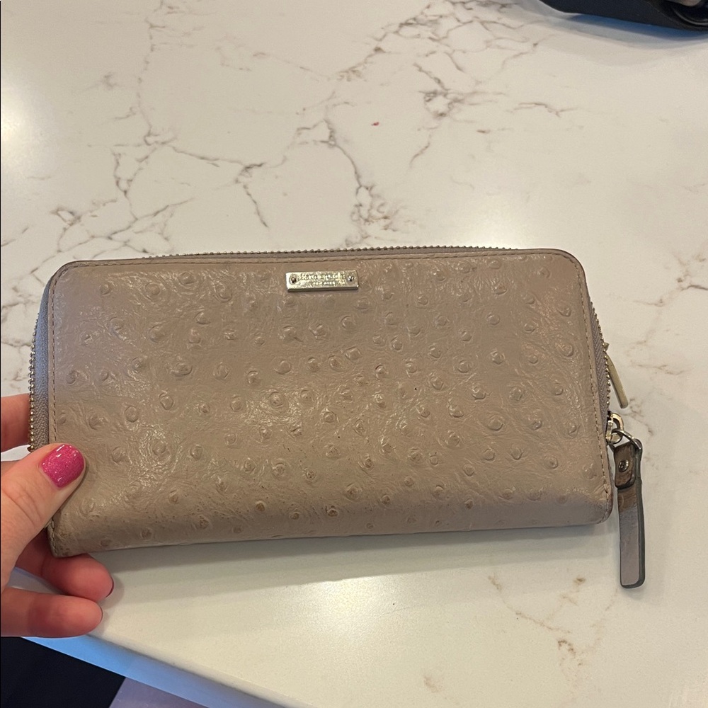 kate spade embossed taupe zip-around wallet with gold plaque